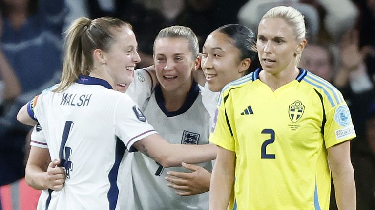 England's Alessia Russo celebrates with team-mates after opening the scoring against Sweden