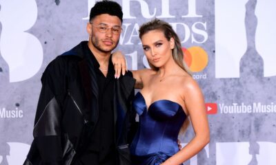 Alex Oxlade-Chamberlain and Perrie Edwards attending the Brit Awards 2019 at the O2 Arena, London. PRESS ASSOCIATION PHOTO. Picture date: Wednesday February 20, 2019. See PA story SHOWBIZ Brits. Photo credit should read: Ian West/PA Wire. EDITORIAL USE ONLY.