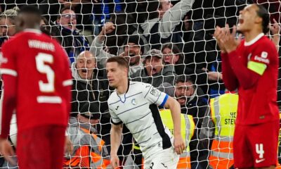 Atalanta's Mario Pasalic celebrates scoring their third goal against Liverpool