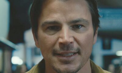 Josh Harnett smiles unsettingly into the camera in trap movie trailer