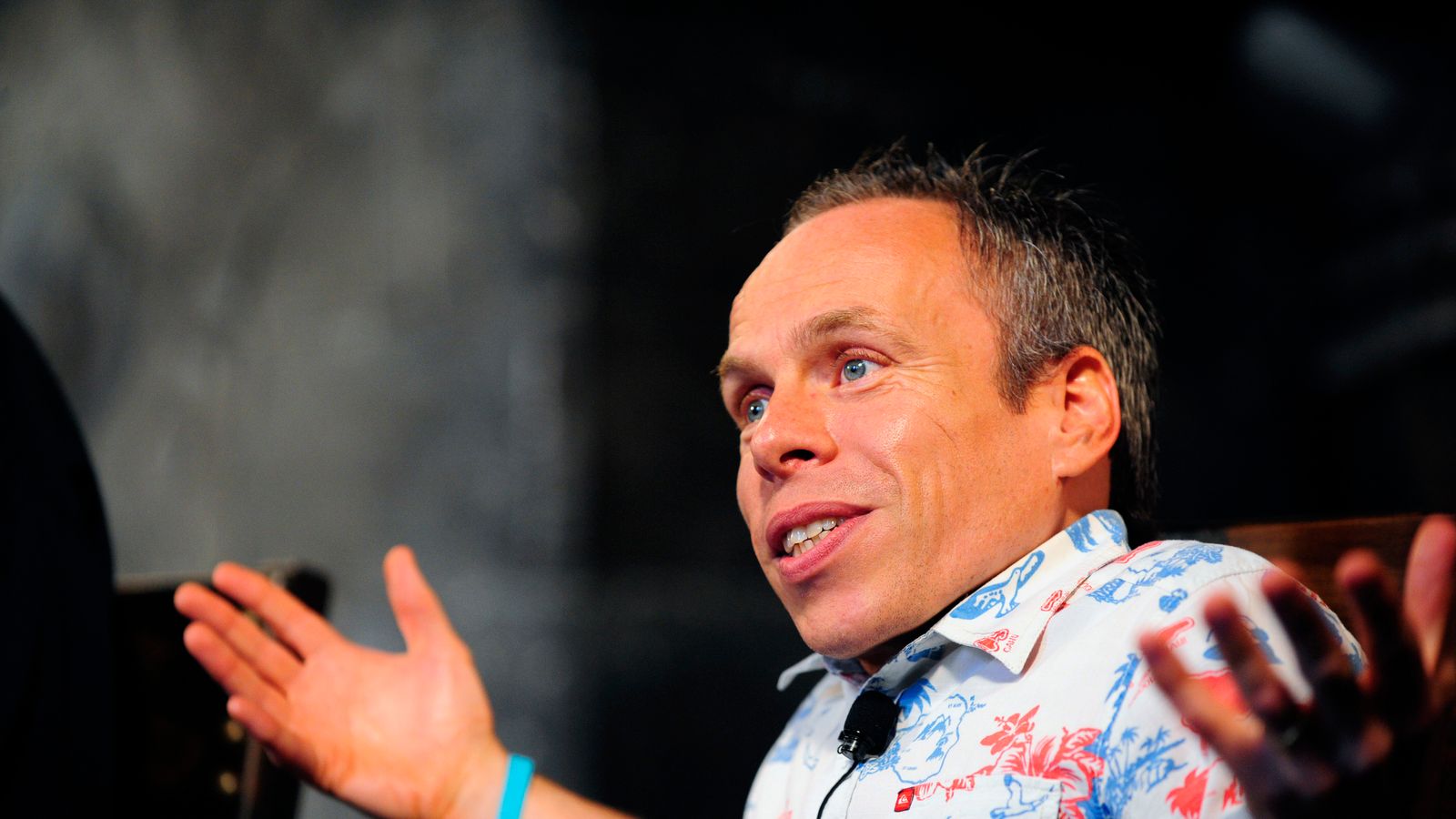 Actor Warwick Davis talks during a media preview of The Wizarding World of Harry Potter-Diagon Alley at the Universal Orlando Resort in Orlando, Florida June 19, 2014. The new attraction, which opens to the public on July 8, expands the original Harry Potter world, which opened in 2010 and is modeled after Hogsmeade Village, which is located near the Hogwarts School of Witchcraft and Wizardry where the series' leading character Harry Potter begins his magical adventures. REUTERS/David Manning  (UNITED STATES - Tags: ENTERTAINMENT BUSINESS)
