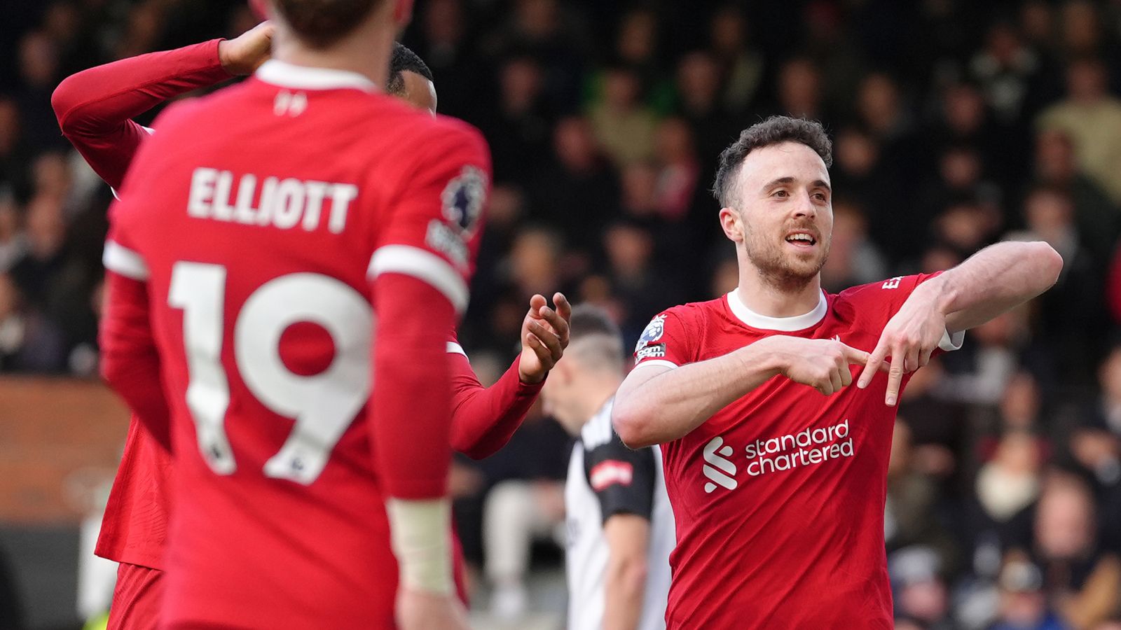 Liverpool's Diogo Jota celebrates scoring their side's third goal of the game