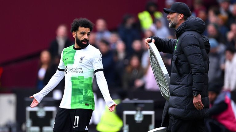 Mohamed Salah and Jurgen Klopp exchange words prior to the Egyptian entering the fray against West Ham