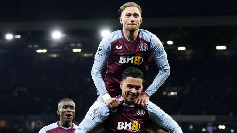 Morgan Rogers (bottom) celebrates after scoring Aston Villa's second goal against Chelsea