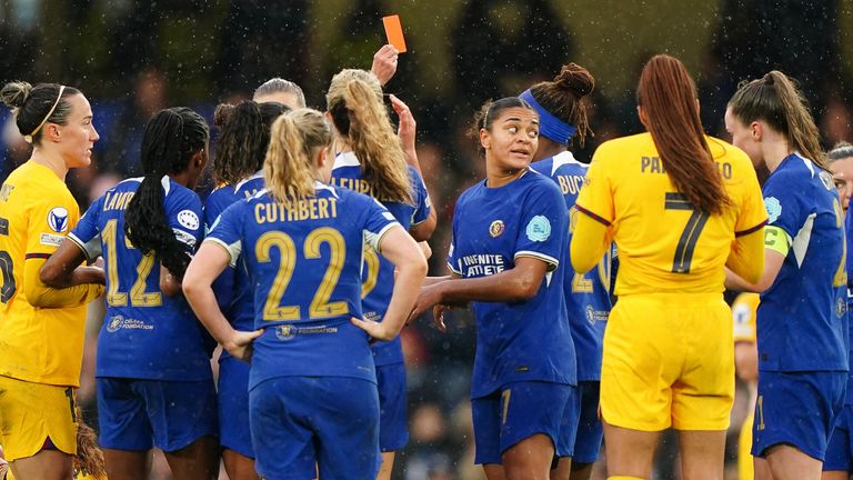 Kadeisha Buchanan is shown a red card by match referee Iuliana Demetrescu