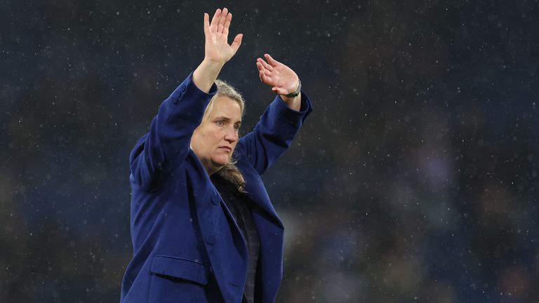 Emma Hayes waves to the crowd at Stamford Bridge