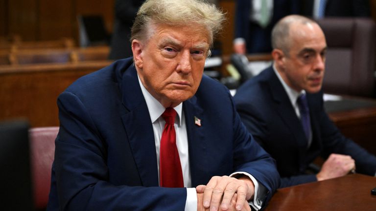 Donald Trump  sits in Manhattan Criminal Court in New York.
Pic: Reuters