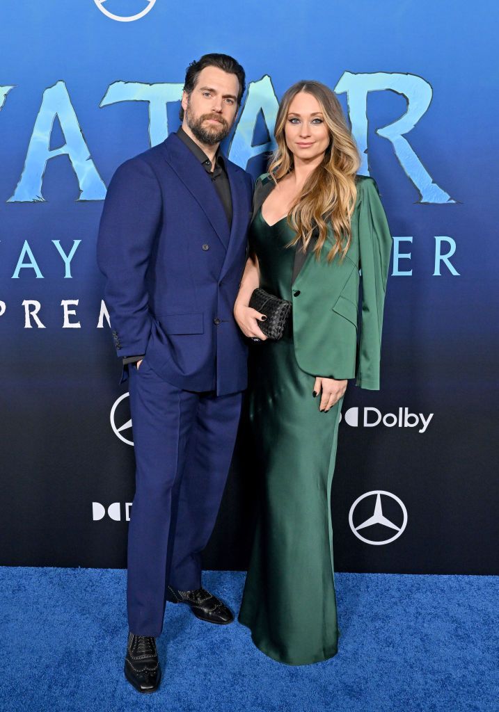 a man and woman posing for a picture