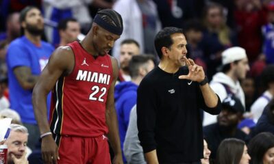 PHILADELPHIA, PENNSYLVANIA - APRIL 17: Head coach Erik Spoelstra and Jimmy Butler #22 of the Miami Heat during the fourth quarter against the Philadelphia 76ers during the Eastern Conference Play-In Tournament at the Wells Fargo Center on April 17, 2024 in Philadelphia, Pennsylvania. NOTE TO USER: User expressly acknowledges and agrees that, by downloading and or using this photograph, User is consenting to the terms and conditions of the Getty Images License Agreement. (Photo by Tim Nwachukwu/Getty Images)