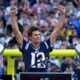 Tom Brady acknowledges his fans during a halftime celebration and the announcement of his induction in the the Patriots Hall of Fame.