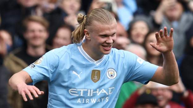 Man City 5-1 Wolves: Erling Haaland scores four as City move a point behind Arsenal