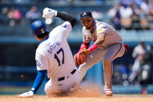 Los Angeles Dodgers designated hitter Shohei Ohtani is out at...