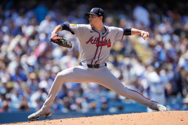 Atlanta Braves starting pitcher Max Fried throws during a baseball...