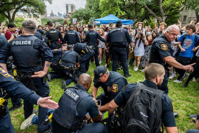 College students are arrested in the course of the protest in Austin on April 24. <a href=