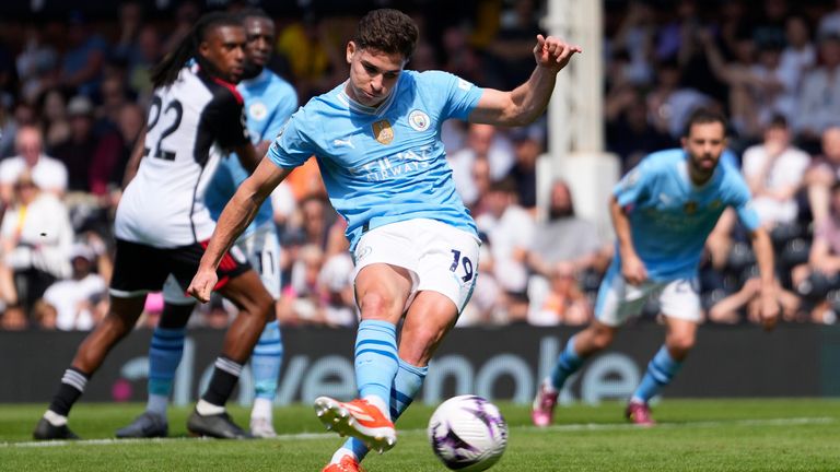 Julian Alvarez scores Man City's fourth goal from the penalty spot