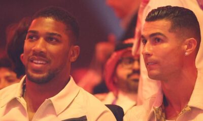 Anthony Joshua sits beside Cristiano Ronaldo to watch Fury vs Usyk