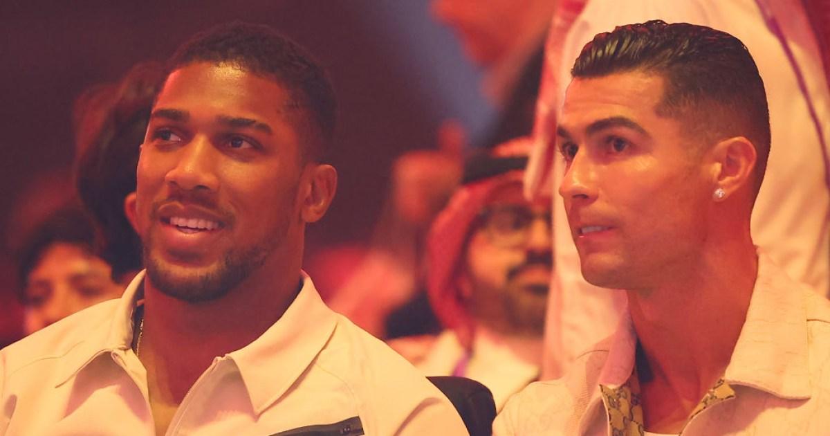 Anthony Joshua sits beside Cristiano Ronaldo to watch Fury vs Usyk