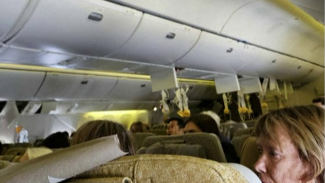 This photo shows oxygen masks that feel during severe turbulence on board a Singapore Airlines flight on Monday, May 20, 2024.