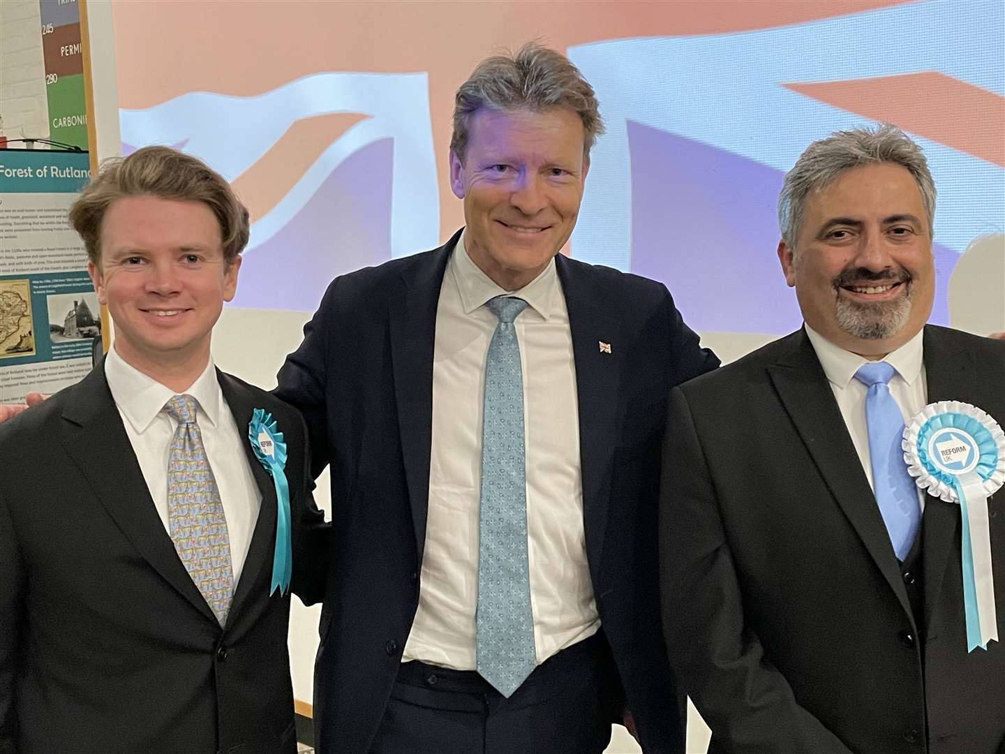 From left, Reform UK party candidate for Rutland and Stamford Christopher Clowes, Reform UK leader Richard Tice, and the party's prospective candidate for Northampton North, Anthony Antoniou