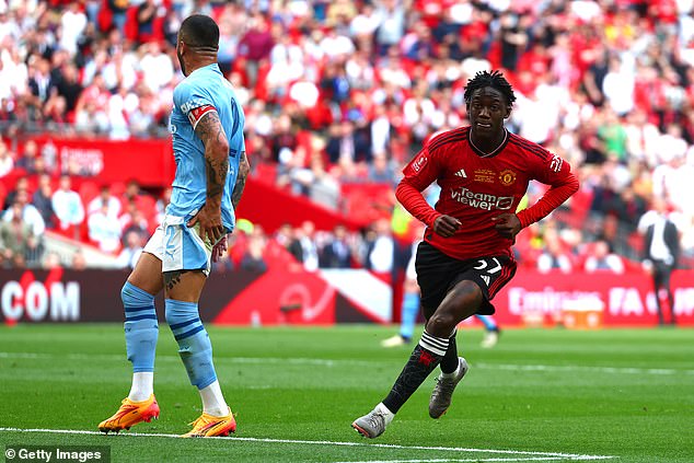 Mainoo wheels away after scoring the winning for Man United in Saturday's FA Cup Final