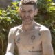 Paul Anderson looks ‘dishevelled’ as he walks streets topless leaving friends ‘concerned’ ahead of Peaky Blinders movie