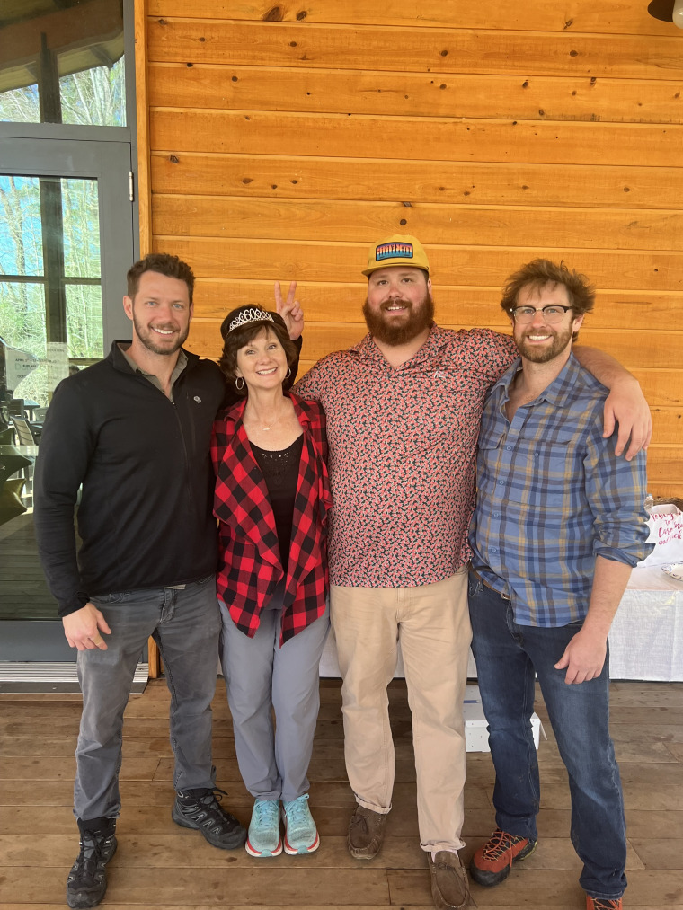 Johnny Wactor, left, with his mother, Scarlett, and brothers Grant and Lance.