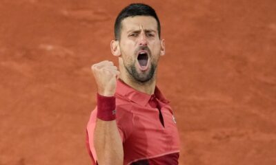 Serbia's Novak Djokovic clenches his fist after scoring a point against France's Pierre-Hugues Herbert during their first round match of the French Open tennis tournament at the Roland Garros stadium in Paris, Tuesday, May 28, 2024. (AP Photo/Christophe Ena)