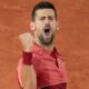 Serbia's Novak Djokovic clenches his fist after scoring a point against France's Pierre-Hugues Herbert during their first round match of the French Open tennis tournament at the Roland Garros stadium in Paris, Tuesday, May 28, 2024. (AP Photo/Christophe Ena)