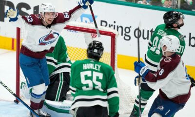 Colorado Avalanche left wing Artturi Lehkonen (62) reacts after teammate defenseman Cale Makar (8) scored a goal against the Dallas Stars during the third period in Game 5 of an NHL hockey Stanley Cup second-round playoff series, Wednesday, May 15, 2024, in Dallas. Looking on are Stars' Thomas Harley (55) and Tyler Seguin (91). (AP Photo/Tony Gutierrez)