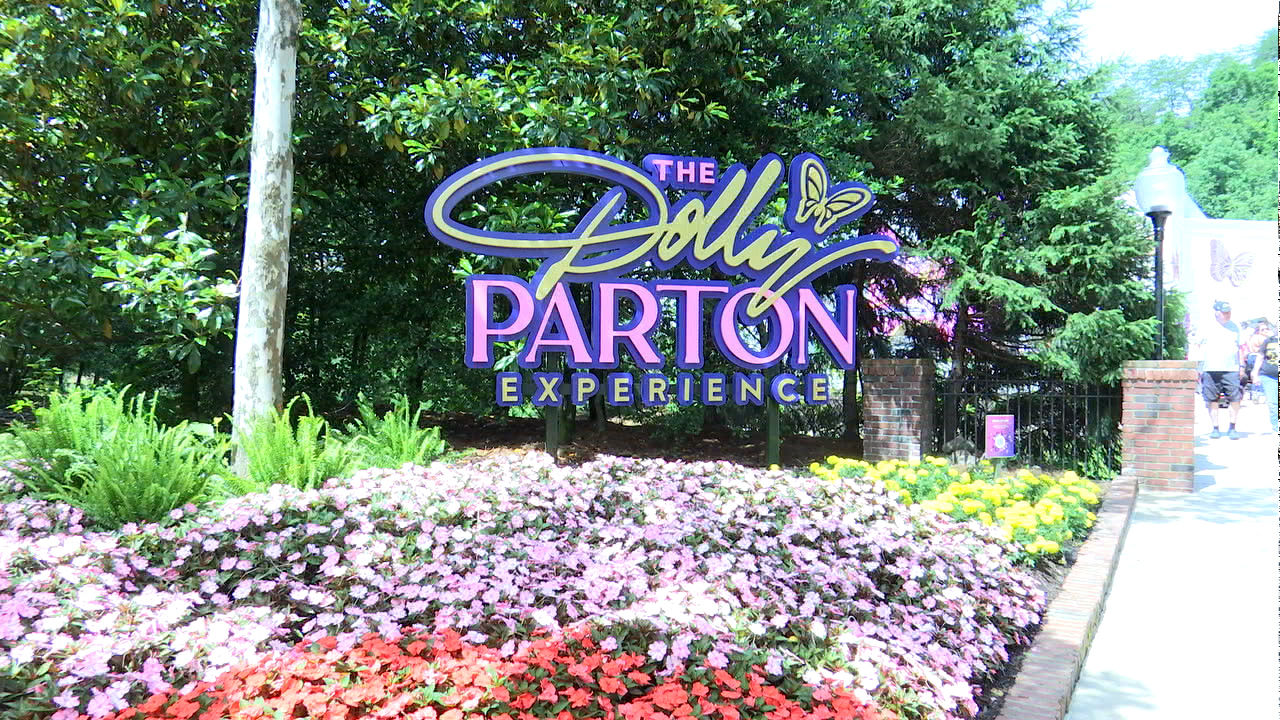 Dolly Parton teases new project at Dolly Parton Experience opening event