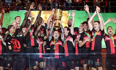 Bayer Leverkusen celebrate winning the DFB Pokal to bag an undefeated German double