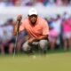 LOUISVILLE, KENTUCKY - MAY 16: Tiger Woods of the United States lines up a putt on the 14th green during the first round of the 2024 PGA Championship at Valhalla Golf Club on May 16, 2024 in Louisville, Kentucky. (Photo by Christian Petersen/Getty Images)