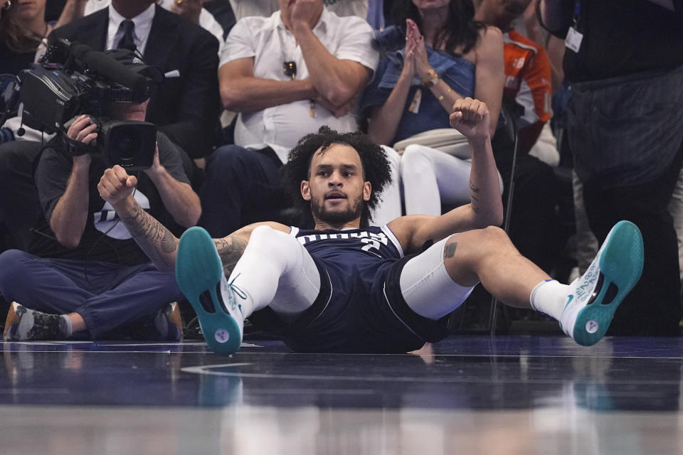 Dereck Lively II left the first half of Sunday's playoff Mavericks-Timberwolves playoff game after taking a knee to the back of his head. (AP Photo/Julio Cortez)