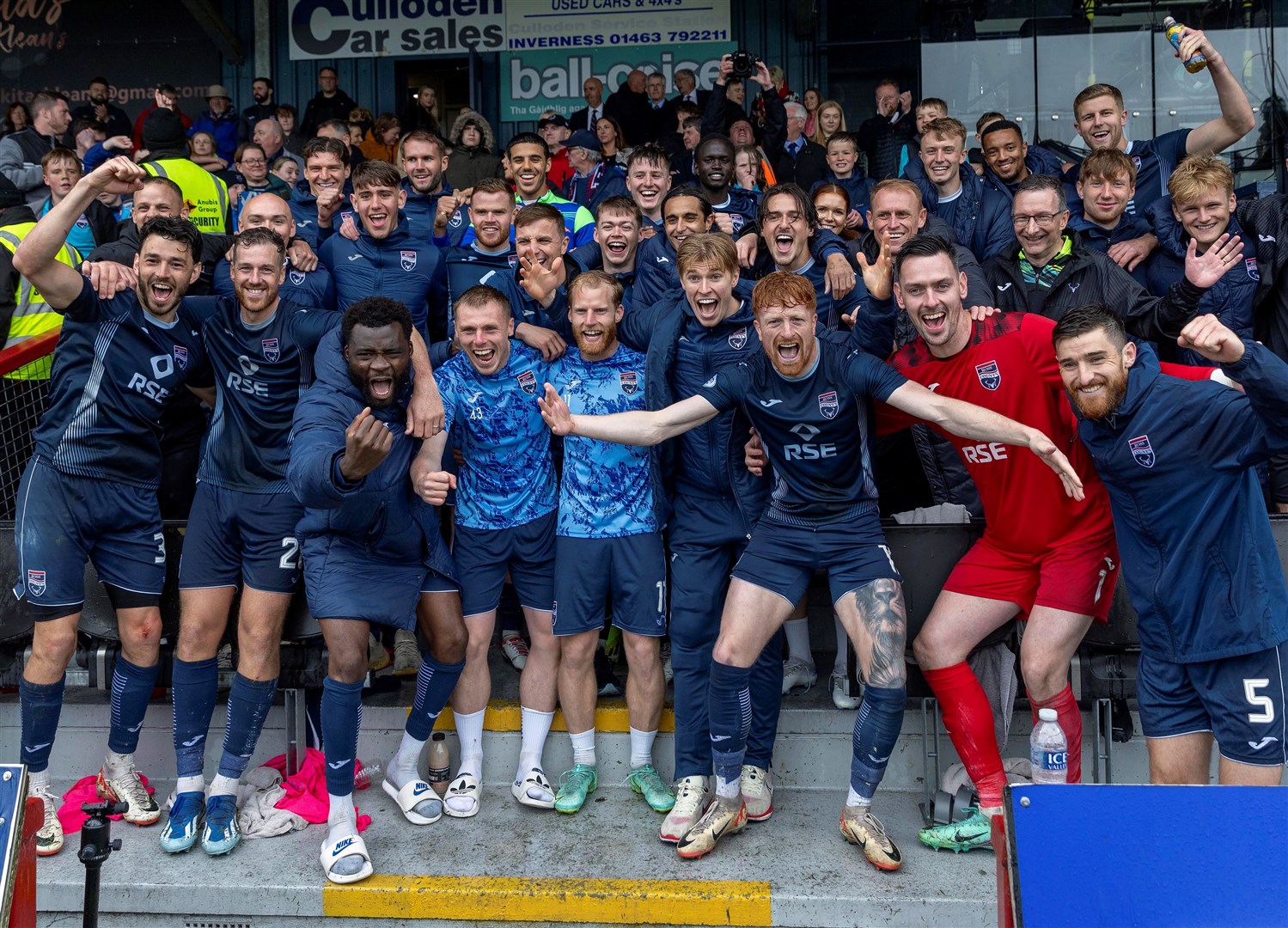 Ross County's squad celebrate securing their Premiership status in the play-off final against Raith Rovers. Picture: Ken Macpherson