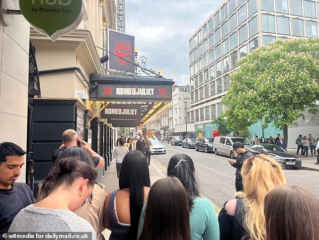 Fans wait for the arrival of Tom Holland outside the Duke of York's Theatre on May 24