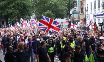 Police among protesters at Tommy Robinson march. Pic: PA