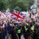 Police among protesters at Tommy Robinson march. Pic: PA