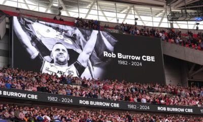 A large screen tribute to Rob Burrow at Wembley. Pic: PA