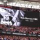 A large screen tribute to Rob Burrow at Wembley. Pic: PA