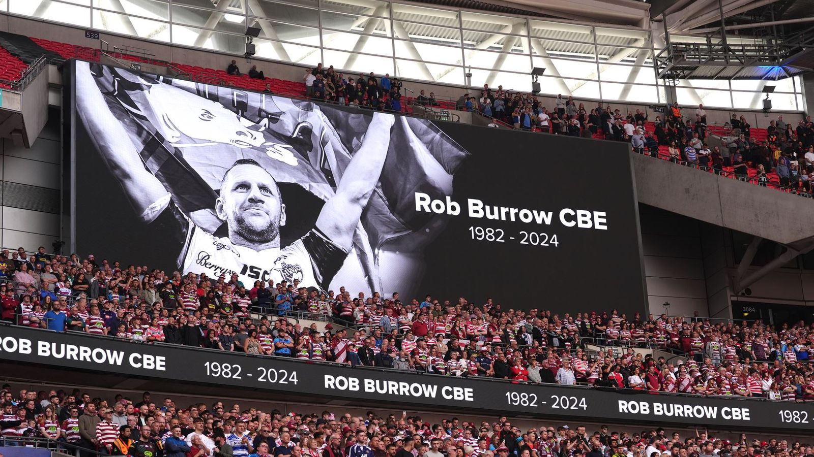 A large screen tribute to Rob Burrow at Wembley. Pic: PA