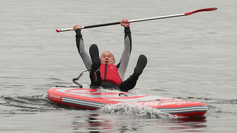 Pic: Reuters
British leader of the Liberal Democrats party Ed Davey falls from a paddle board, at Lake Windermere in Windermere, Britain, May 28, 2024. REUTERS/Phil Noble