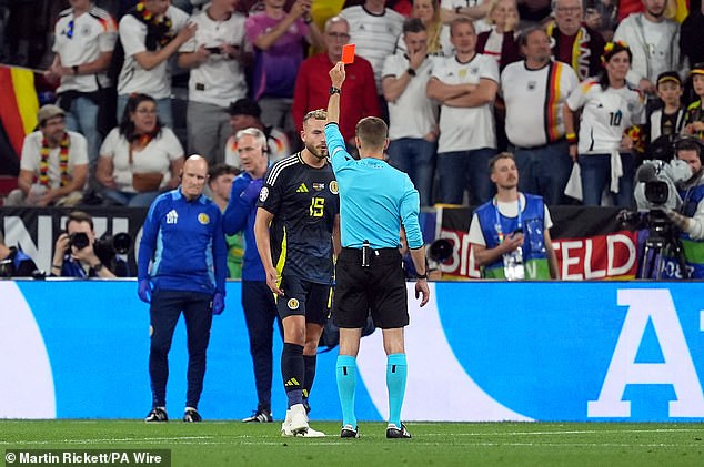 Referee Clement Turpin wasted no time in showing the Scotland international a red card