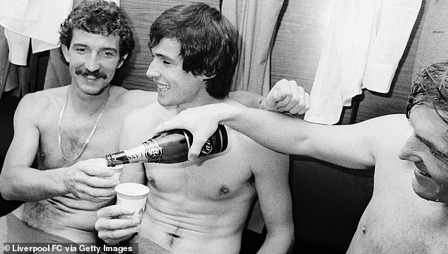 Hansen (centre) is a rare breed and nobody has a bad word to say about him. Here, he is pictured after winning the title with Liverpool in 1983