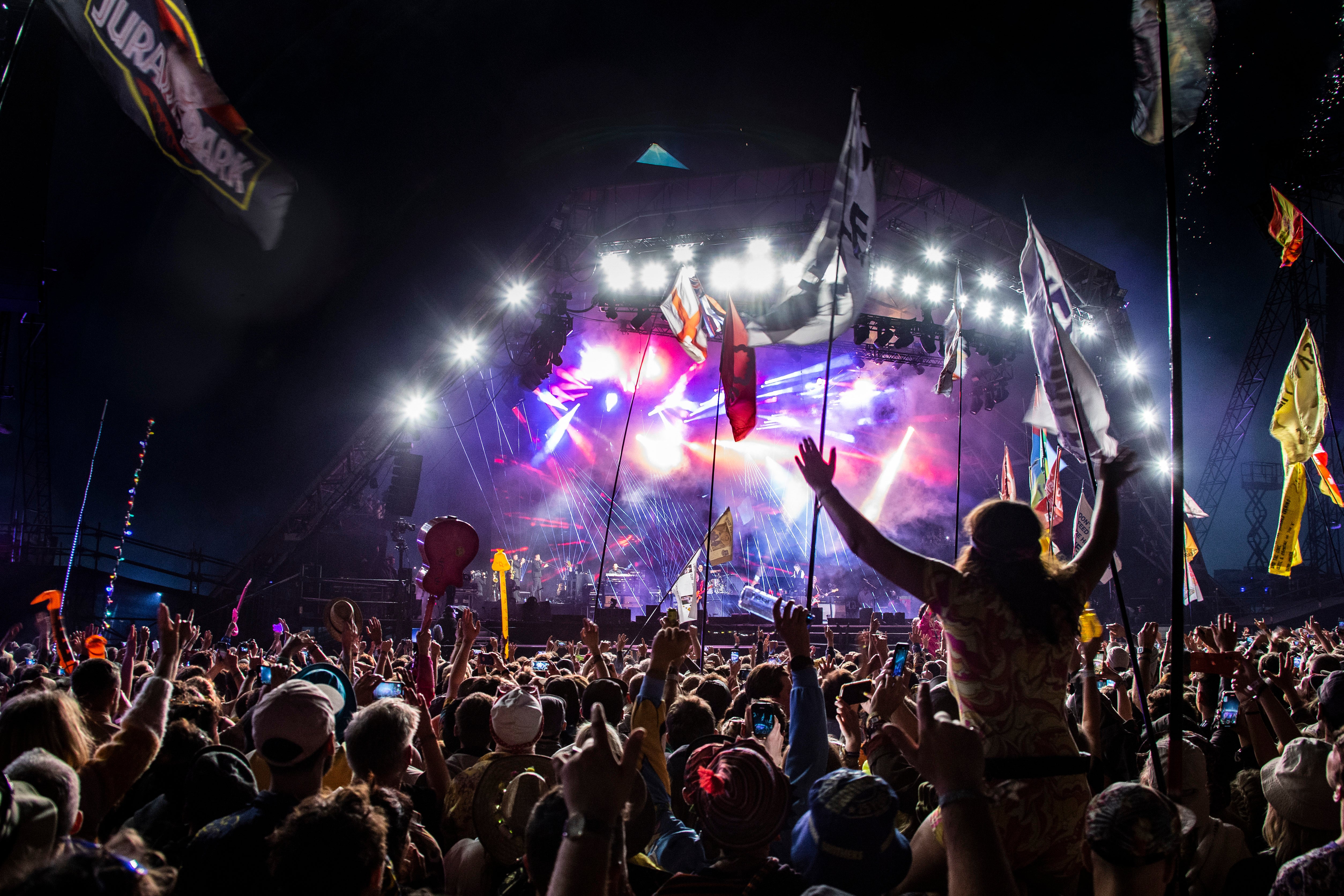 Glastonbury revellers watch Paul McCartney headline the Pyramid Stage in 2022