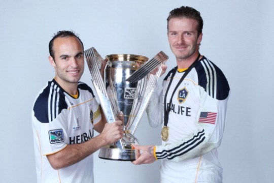 Landon Donovan and David Beckham pictured with the MLS Cup trophy