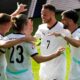 Austria players celebrate after taking the lead against the Netherlands through a Donyell Malen own goal