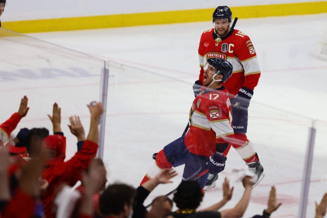 Jun 10, 2024; Sunrise, Florida, USA; Florida Panthers forward Evan Rodrigues (17) celebrates scoring during the third period against the Edmonton Oilers in game two of the 2024 Stanley Cup Final at Amerant Bank Arena. Mandatory Credit: Sam Navarro-USA TODAY Sports