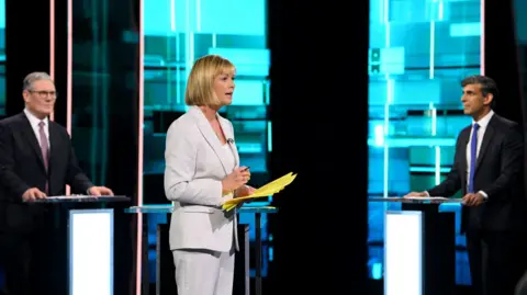 ITV/PA Julie Etchingham presents ITV's televised debate between Sir Keir Starmer and Prime Minister Rishi Sunak