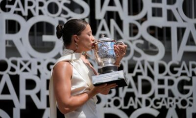 Iga Swiatek plays down chances of adding Wimbledon title to French Open crowns