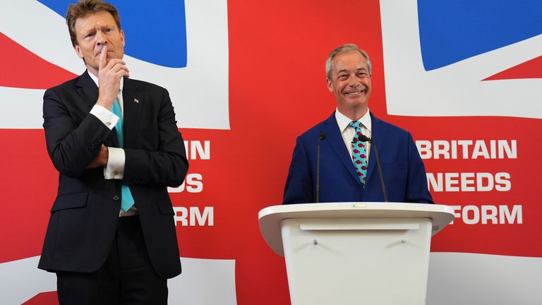 Nigel Farage (right) and Richard Tice announce their party's economic policy during a press conference at Church House.
Pic: PA